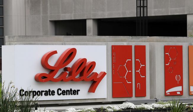FILE - This April 26, 2017, file photo shows the Eli Lilly &amp;amp; Co. corporate headquarters in Indianapolis.  The drug company on Wednesday, Sept. 16, 2020, says that partial results from a study testing an antibody drug in mild to moderately ill COVID-19 patients give hints that the drug may help keep them from needing to be hospitalized, a goal no current coronavirus medicine has been able to meet. (AP Photo/Darron Cummings, File)