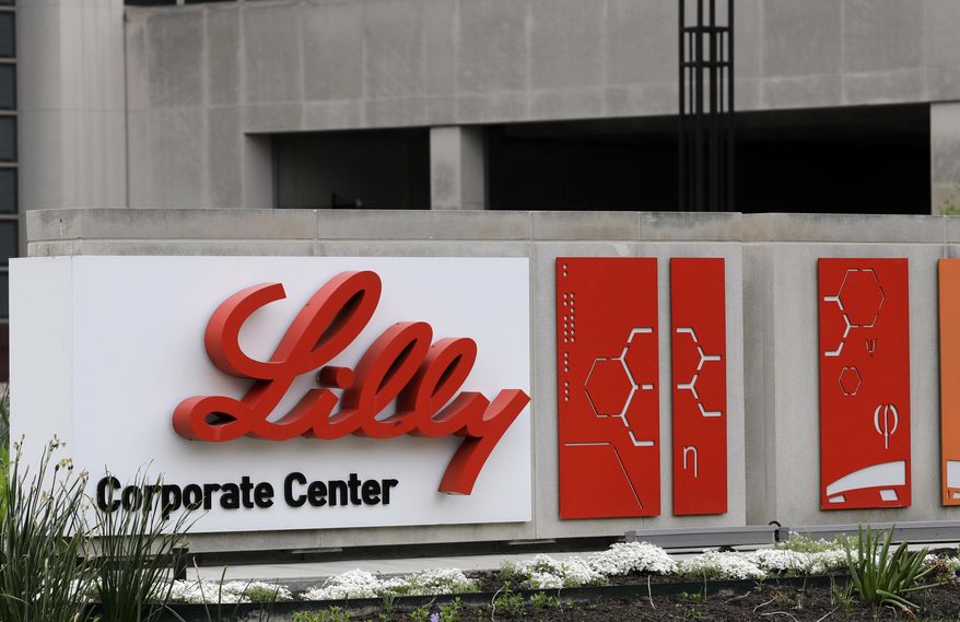FILE - This April 26, 2017, file photo shows the Eli Lilly &amp;amp; Co. corporate headquarters in Indianapolis.  The drug company on Wednesday, Sept. 16, 2020, says that partial results from a study testing an antibody drug in mild to moderately ill COVID-19 patients give hints that the drug may help keep them from needing to be hospitalized, a goal no current coronavirus medicine has been able to meet. (AP Photo/Darron Cummings, File)