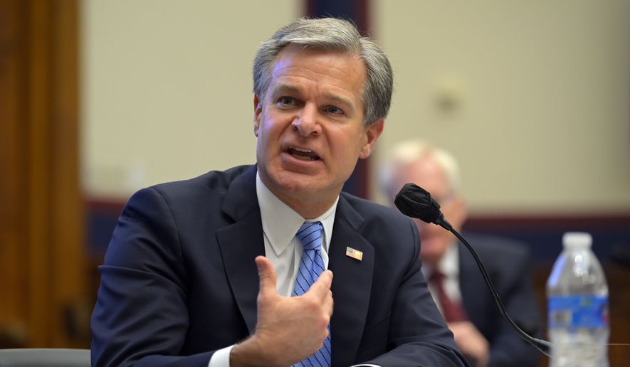 FBI Director Christopher Wray testifies before a House Committee on Homeland Security hearing Thursday, Sept. 17, 2020, on Capitol Hill Washington. (John McDonnell/The Washington Post, Pool via AP) ** FILE **