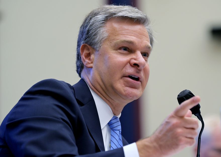 Federal Bureau of Investigation Director Christopher Wray testifies before a House Committee on Homeland Security hearing on &#39;worldwide threats to the homeland&#39;, Thursday, Sept. 17, 2020 on Capitol Hill Washington. (John McDonnell/The Washington Post via AP, Pool)