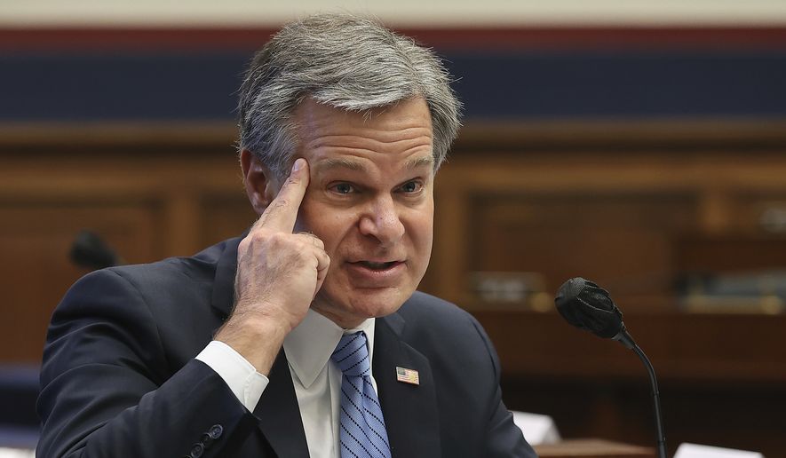 Federal Bureau of Investigation Director Christopher Wray testifies before a House Committee on Homeland Security hearing on &#39;worldwide threats to the homeland&#39;, Thursday, Sept. 17, 2020 on Capitol Hill Washington. (Chip Somodevilla/Pool via AP)  **FILE**
