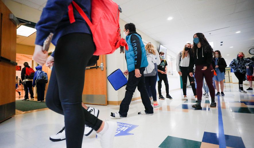 As students return to classrooms this fall, President Trump and Democratic presidential nominee Joseph R. Biden are laying out vastly different visions for education policies in America. (Associated Press)
