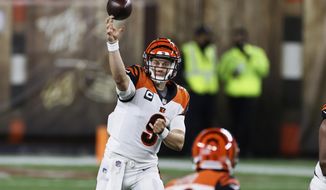 Cincinnati Bengals quarterback Joe Burrow throws a pass during the first half of the team&#39;s NFL football game against the Cleveland Browns, Thursday, Sept. 17, 2020, in Cleveland. (AP Photo/Ron Schwane)