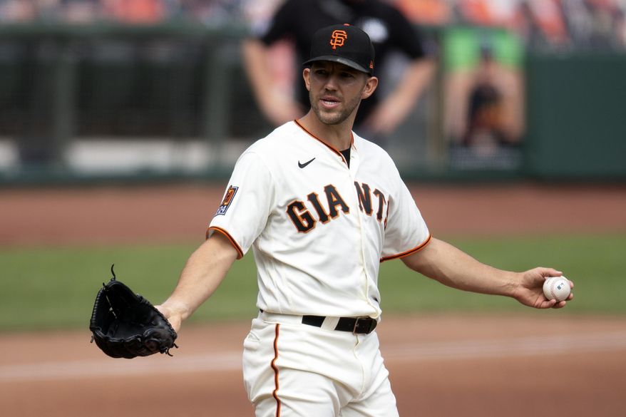 San Francisco Giants starting pitcher Tyler Anderson (31) reacts to comments from the Seattle Mariners dugout after he hit Kyle Seager with a pitch during the second inning of a baseball game, Thursday, Sept. 17, 2020 in San Francisco. (AP Photo/D. Ross Cameron)