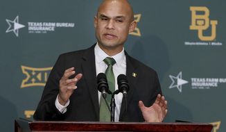 FILE - In this Jan. 20, 2020 file photo, Baylor&#x27;s new head football coach Dave Aranda addresses the media during an NCAA college football news conference in Waco, Texas.   Aranda will make his delayed debut as Baylor&#x27;s coach in a quickly arranged and unexpected reunion of old Southwest Conference rivals. Baylor and Houston open this pandemic-altered season Saturday, Sept. 19,  with their first meeting since the SWC’s final season in 1995.  (Jerry Larson/Waco Tribune-Herald via AP, File)