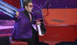 FILE - In this Feb. 9, 2020, file photo, Elton John performs &amp;quot;(I&#39;m Gonna) Love Me Again,&amp;quot; nominated for the award for best original song, from &amp;quot;Rocketman&amp;quot; at the Oscars in Los Angeles. John is opening up his vault and releasing an expansive collection of rarely heard and unreleased tracks. John announced Thursday, Sept. 17, 2020, that the eight-CD collection, “Elton: Jewel Box,&amp;quot; will be released Nov. 13. The collection includes “Sing Me No Sad Songs,” an unreleased studio demo from 1969. (AP Photo/Chris Pizzello, File)