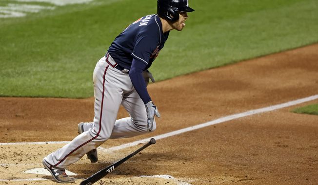 Atlanta Braves&#x27; Freddie Freeman starts to run after hitting a two-RBI double during the second inning of a baseball game against the New York Mets, Friday, Sept. 18, 2020, in New York. (AP Photo/Adam Hunger)
