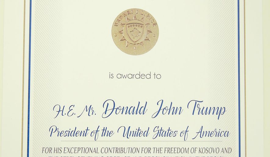 A photo of the Order of Freedom awarded to the U.S President Donald Trump, undersigned by Kosovo&#x27;s President Hashim Thaci in capital Pristina, Kosovo on Friday, Sept. 18, 2020. Kosovo&#x27;s president awarded U.S. President Donald Trump with one of the country&#x27;s highest medals - Kosovo&#x27;s Order of Freedom - for his government&#x27;s efforts on peace and reconciliation in the former war-torn region. (AP Photo/Visar Kryeziu)