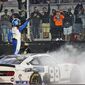 Chase Briscoe celebrates winning the NASCAR Xfinity Series auto race Friday, Sept. 18, 2020, in Bristol, Tenn. (AP Photo/Steve Helber)