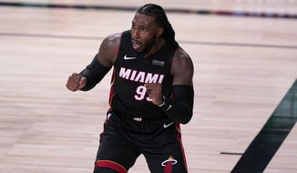 Miami Heat&#39;s Jae Crowder gestures after being charged with a foul on a shot attempt by the Boston Celtics during the second half of an NBA conference final playoff basketball game, Saturday, Sept. 19, 2020, in Lake Buena Vista, Fla. (AP Photo/Mark J. Terrill)