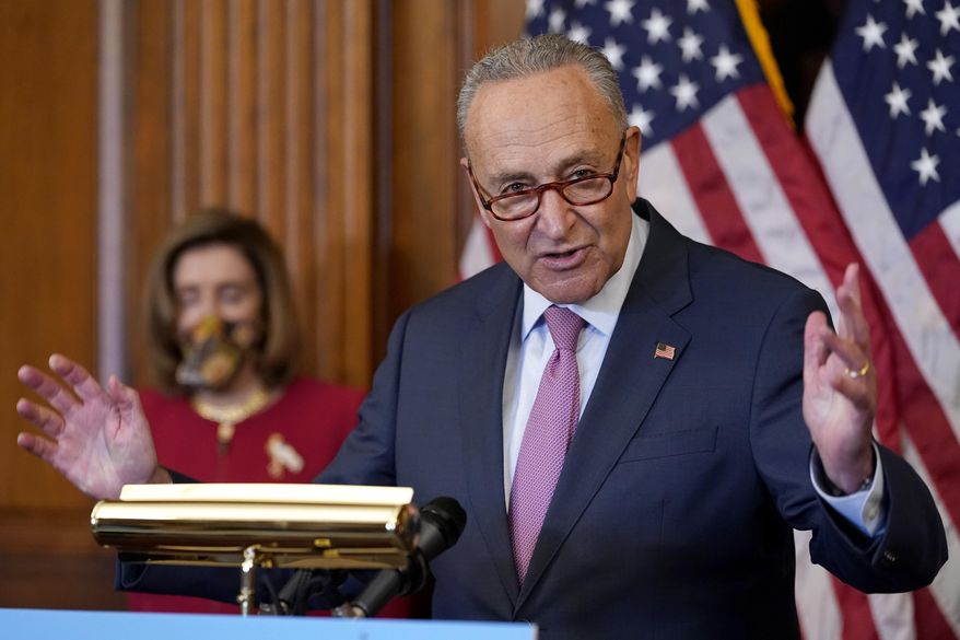 In this file photo, Senate Minority Leader Sen. Chuck Schumer of N.Y., right, speaks next to House Speaker Nancy Pelosi of Calif., during a news conference about COVID-19, Thursday, Sept. 17, 2020, on Capitol Hill in Washington. (AP Photo/Jacquelyn Martin)  **FILE**