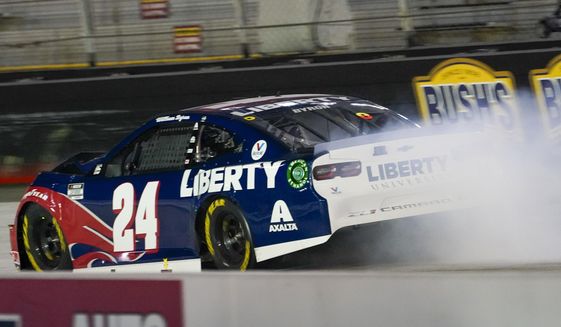 William Byron&#39;s car leaves a trail of smoke after an accident during the NASCAR Cup Series auto race Saturday, Sept. 19, 2020, in Bristol, Tenn. (AP Photo/Steve Helber)