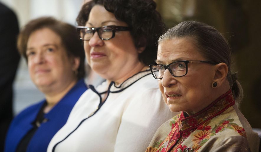 From left to right, U.S. Supreme Court, Associate Justices, Elena Kagan, Sonia Sotomayor, and Ruth Bader Ginsburg, on stage during a Women&#x27;s History Month reception at Statuary Hall on Capitol Hill, hosted by Democratic Leader Rep. Nancy Pelosi, D-Calif., Wednesday, March 18, 2015, in Washington. Ruth Bader Ginsburg died at her home in Washington, on Sept. 18, 2020, the Supreme Court announced. (AP Photo/Pablo Martinez Monsivais)