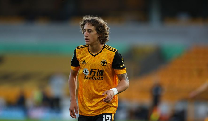 Wolverhampton Wanderers' Fabio Silva runs during the English League Cup soccer match between Wolverhampton Wanderers and Stoke City, in Molineux Stadium in Wolverhampton, England, Thursday, Sept. 17, 2020. (Cath Ivill/Pool via AP)