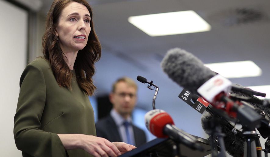New Zealand Prime Minister Jacinda Ardern addresses a press conference on the latest COVID-19 updates in Auckland, New Zealand, Monday, Sept. 21, 2020. All remaining virus restrictions will be lifted across much of New Zealand from late Monday, with the exception of the largest city, Auckland, which will continue to have some restrictions for at least another 16 days. (Greg Bowker/NZ Herald via AP)