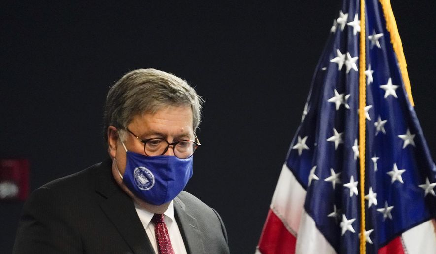 U.S. Attorney General William Barr arrives to speak with federal officials for a panel discussion on combatting human trafficking at the U.S. Attorney&#x27;s Office on Monday, Sept. 21, 2020, in Atlanta. (AP Photo/Brynn Anderson)