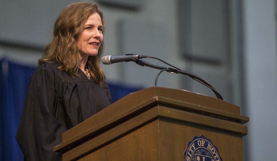 In this May 19, 2018, photo, Amy Coney Barrett, United States Court of Appeals for the Seventh Circuit judge, speaks during the University of Notre Dame&#39;s Law School commencement ceremony at the university, in South Bend, Ind. Barrett, a front-runner to fill the Supreme Court seat vacated by the death of Justice Ruth Bader Ginsburg, has established herself as a reliable conservative on hot-button legal issues from abortion to gun control. (Robert Franklin/South Bend Tribune via AP) **FILE**