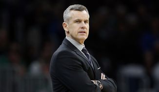  In this March 8, 2020, file photo, Oklahoma City Thunder coach Billy Donovan watches during the second half of the team&#39;s NBA basketball game against the Boston Celtics in Boston. The Chicago Bulls hired Donovan as coach Tuesday, Sept. 22. The 55-year-old Donovan spent the last five seasons with the Thunder. He replaces Jim Boylen, who was fired after the Bulls finished 22-43 and were one of the eight teams that didnt qualify for the NBAs restart at Walt Disney World. (AP Photo/Michael Dwyer, File)  **FILE**