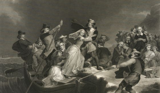 This circa 1869 engraving titled &amp;quot;Landing of the Pilgrims on Plymouth Rock, 1620&amp;quot; made available by the Library of Congress depicts a woman being helped ashore from a small boat held in position against a rock by men with ropes and poles. At background right, other Pilgrims kneel in prayer. (Peter Frederick Rothermel, Joseph Andrews/Library of Congress via AP)