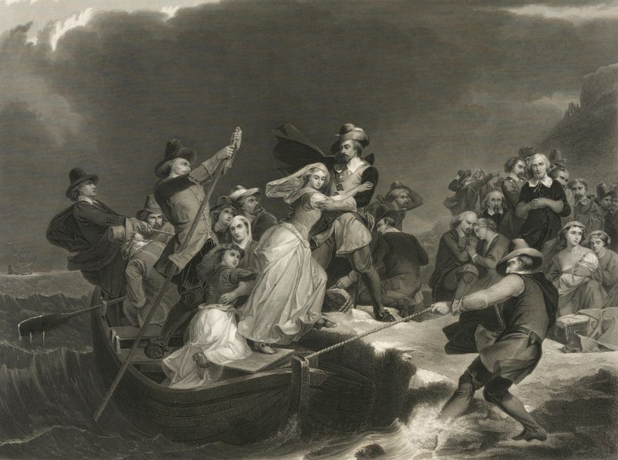 This circa 1869 engraving titled &amp;quot;Landing of the Pilgrims on Plymouth Rock, 1620&amp;quot; made available by the Library of Congress depicts a woman being helped ashore from a small boat held in position against a rock by men with ropes and poles. At background right, other Pilgrims kneel in prayer. (Peter Frederick Rothermel, Joseph Andrews/Library of Congress via AP)