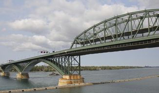 This photo shows a general view of the Peace Bridge, Tuesday, Sept. 22, 2020, in Buffalo N.Y.  Pascale Ferrier, a Canadian woman accused of mailing a package containing the poison ricin to the White House, was taken into custody Sunday, Sept. 20 by U.S. Customs and Border Protection officers at the Peace Bridge border crossing near Buffalo and is expected to face federal charges Tuesday in Buffalo, New York. (AP Photo/Jeffrey T. Barnes)