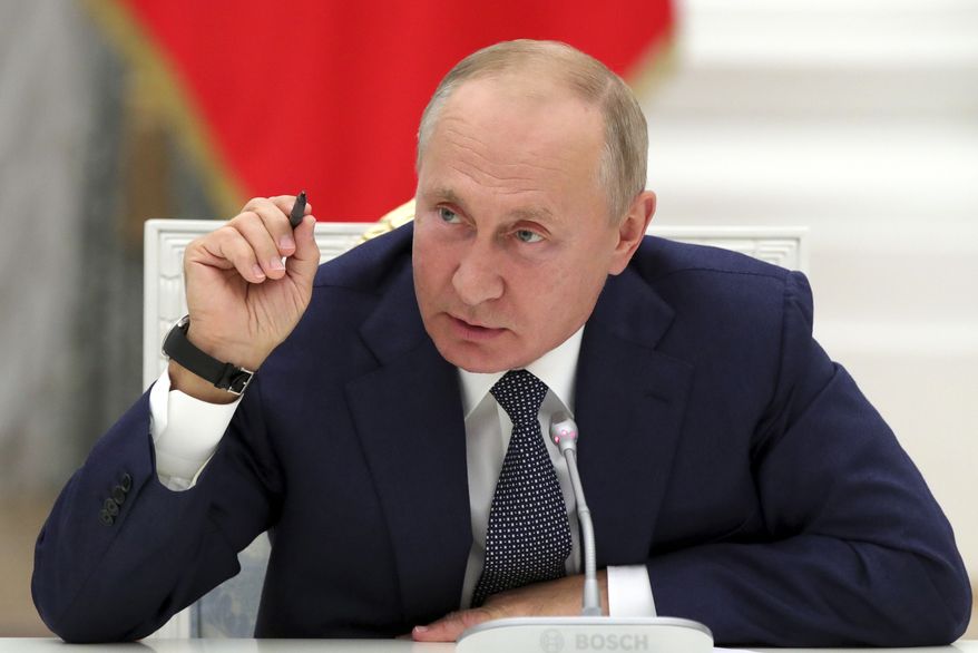 Russian President Vladimir Putin said last year that he is open to striking an agreement to extend the treaty "without any preconditions." (Associated Press/File)