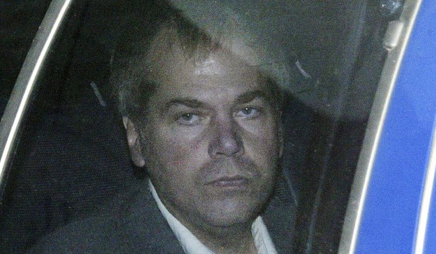 In this Nov. 18, 2003, file photo, John Hinckley Jr. arrives at U.S. District Court in Washington. Hinckley, who tried to assassinate President Ronald Reagan may soon get the most freedom he&#39;s had since since the shooting outside a Washington hotel in 1981. A lawyer for Hinckley Jr. and U.S. attorneys are discussing a possible agreement that would substantially reduce the conditions of Hinckley&#39;s release from a mental hospital in 2016, according to federal court hearing on Wednesday, Sept. 23, 2020.  (AP Photo/Evan Vucci, File)