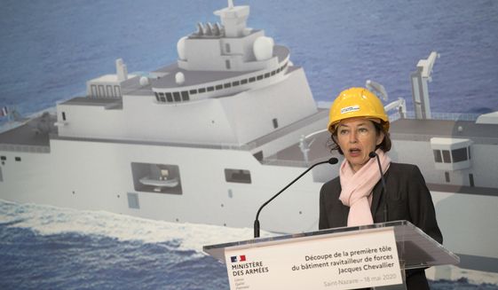 FILE - In this May 18, 2020 file photo, French Defense Minister Florence Parly speaks as she attends the first sheet metal cut ceremony of the C35 force refueling vessel, at the Chantiers de l&#39;Atlantique shipyard in Saint-Nazaire, western France. France&#39;s Defense Minister Florence Parly admitted to lying about virus protections for air force personnel who evacuated French citizens from Wuhan and have been suspected of links to France&#39;s first confirmed COVID-19 cluster. (Loic Venance, pool via AP, File)