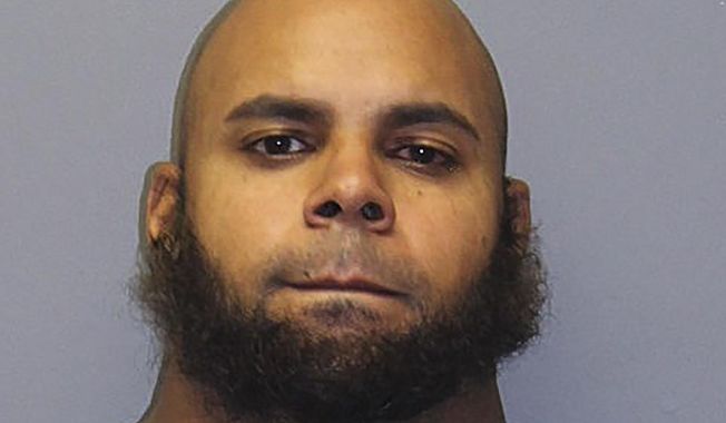 This booking photo provided by the South Windsor Police, shows Alan Rosario, 33, of Springfield, Massachusetts, charged in connection with the workplace shooting that happened in South Windsor, Connecticut, on Tuesday, Sept. 22, 2020. Rosario was extradited from Massachusetts to Connecticut on Wednesday and was charged with assault amongst other charges, Wednesday, Sept. 23, 2020, in South Windsor, Conn. (South Windsor Police via AP)