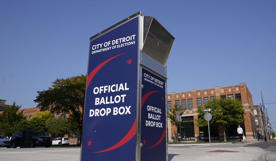 A ballot drop box is shown where voters can drop off absentee ballots instead of using the mail in Detroit Thursday, Sept. 24, 2020. (AP Photo/Paul Sancya)