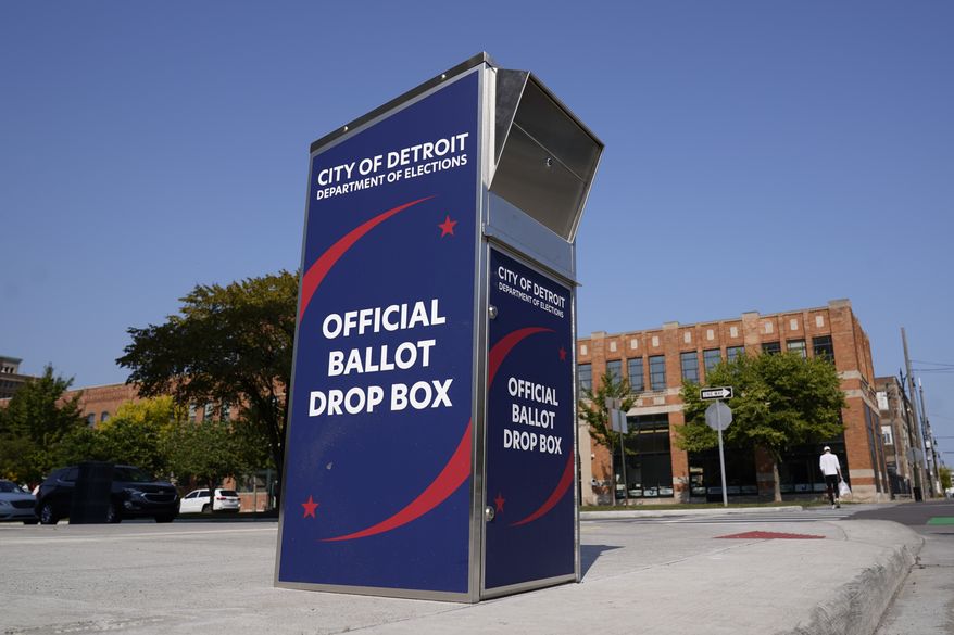 A ballot drop box is shown where voters can drop off absentee ballots instead of using the mail in Detroit Thursday, Sept. 24, 2020. (AP Photo/Paul Sancya)