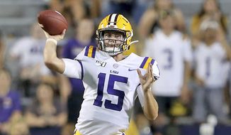 FILE - In this Saturday, Aug. 31, 2019, file photo, LSU Tigers quarterback Myles Brennan (15) passes during an NCAA football game against Georgia Southern in Baton Rouge, La. LSU enters Saturday&#39;s season opener with Myles Brennan taking over at quarterback for Heisman Trophy winner Joe Burrow while Mississippi State has a new coach in Mike Leach whose reputation for high-flying offenses precedes him. (AP Photo/Michael Democker, File)
