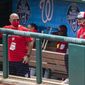 In this Sunday, Aug. 2, 2020, file photo, Washington Nationals manager Dave Martinez, right, with General Manager Mike Rizzo, left, watch from the dugout a baseball intrasquad game at Nationals Park in Washington. For the second season in a row, manager Dave Martinez’s Washington Nationals got off to a 19-31 start. This time, there were not enough games to dig themselves out of that hole. (AP Photo/Manuel Balce Ceneta, File)  **FILE**