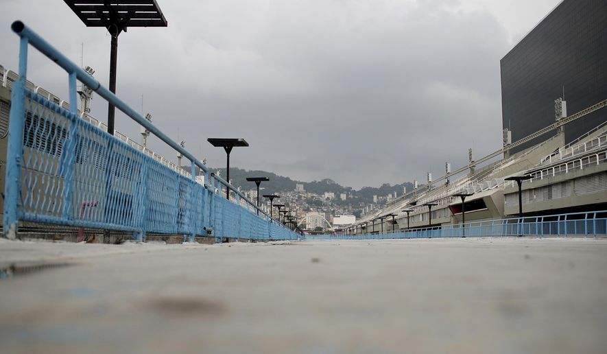 The Sambadrome parade runway stands empty in Rio de Janeiro, Brazil, Monday, Sept. 21, 2020. Rio de Janeiro on Thursday, Sept. 24, said it has delayed its annual Carnival parade, saying the global spectacle cannot go ahead in February because of Brazil’s continued vulnerability to the new coronavirus pandemic. (AP Photo/Silvia Izquierdo)