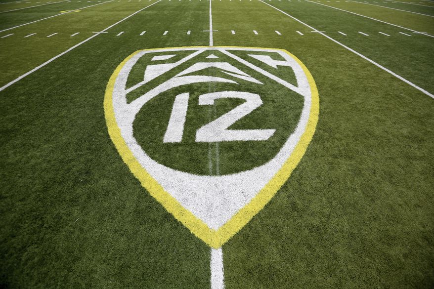 In this Oct. 10, 2015, file photo, a PAC-12 logo is displayed on the field before an NCAA college football game between Washington State and Oregon in Eugene, Ore. The Pac-12 university presidents and chancellors will meet Friday, Sept. 17, 2020, and be presented options for staging a fall football season, but Commissioner Larry Scott says a vote by the the CEO Group is not expected. (AP Photo/Ryan Kang, File) **FILE**