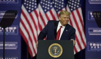 President Donald Trump speaks during a campaign rally, Friday, Sept. 25, 2020, in Atlanta. (AP Photo/John Bazemore)