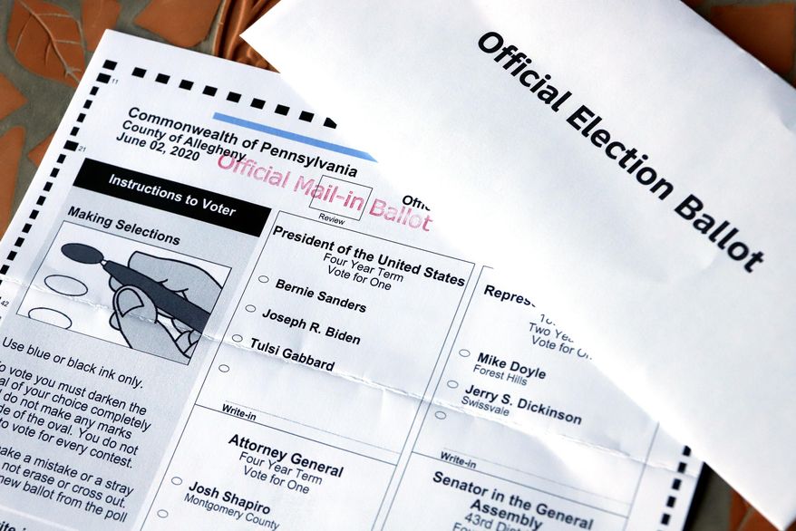 This May 26, 2020, file photo shows an Official Democratic General Primary mail-in ballot and secrecy envelope, for the Pennsylvania primary in Pittsburgh. (AP Photo/Gene J. Puskar, File)