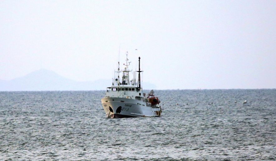 South Korea's government ship for a fishery guidance is seen near Yeonpyeong island, South Korea, Saturday, Sept. 26, 2020. South Korea said Saturday it will request North Korea to further investigate the killing of a South Korean government official who was shot by North Korean troops after being found adrift near the rivals' disputed sea boundary while apparently trying to defect. (Baek Seung-ryul/Yonhap via AP)