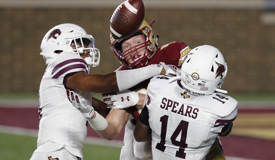 Texas State safeth Zion Childress, left, and safety Tory Spears (14) break up a pass intended for Boston College tight end Hunter Long during the first half of an NCAA college football game Saturday, Sept. 26, 2020, in Boston. (AP Photo/Michael Dwyer)