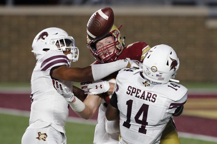 Texas State safeth Zion Childress, left, and safety Tory Spears (14) break up a pass intended for Boston College tight end Hunter Long during the first half of an NCAA college football game Saturday, Sept. 26, 2020, in Boston. (AP Photo/Michael Dwyer)
