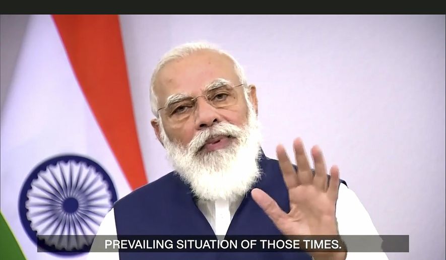In this photo made from UNTV video, Narendra Modi, Prime Minister of India, speaks in a pre-recorded message which was played during the 75th session of the United Nations General Assembly, Saturday, Sept. 26, 2020, at UN Headquarters. (UNTV Via AP )