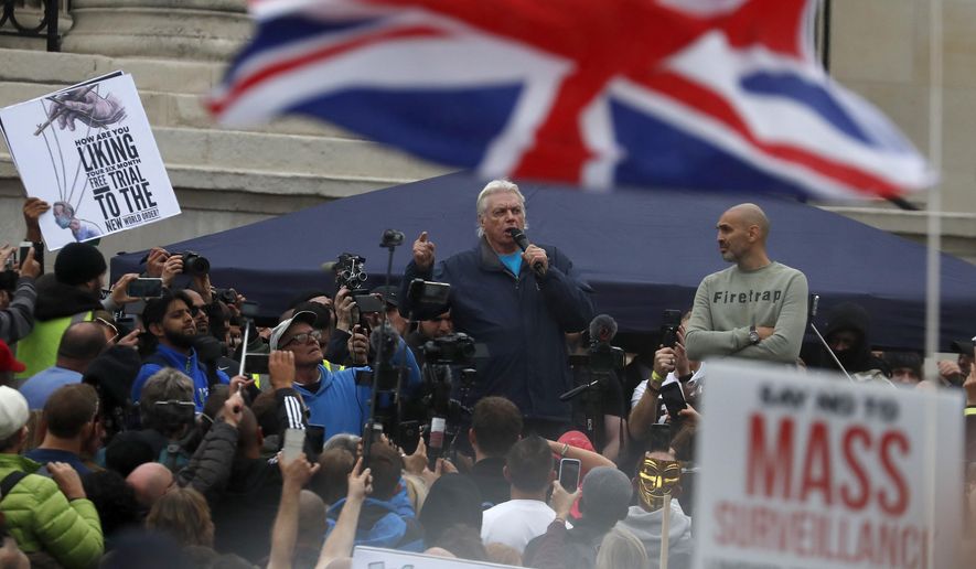 English conspiracy theorist David Icke speaks during a &#39;We Do Not Consent&#39; rally at Trafalgar Square, organised by Stop New Normal, to protest against coronavirus restrictions, in London, Saturday, Sept. 26, 2020. (AP Photo/Frank Augstein)