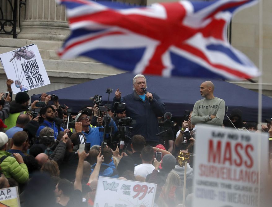 English conspiracy theorist David Icke speaks during a &#x27;We Do Not Consent&#x27; rally at Trafalgar Square, organised by Stop New Normal, to protest against coronavirus restrictions, in London, Saturday, Sept. 26, 2020. (AP Photo/Frank Augstein)
