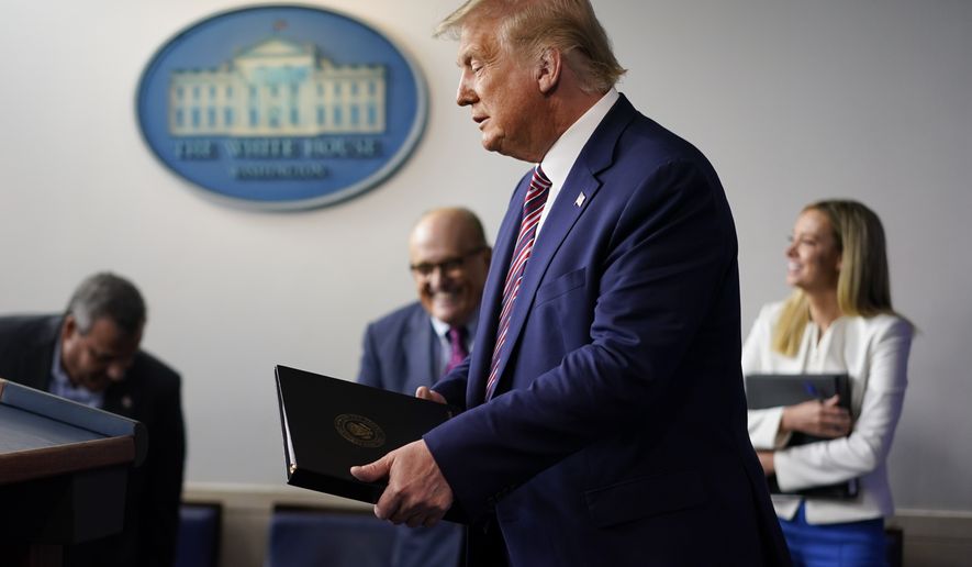 President Donald Trump walk towards the podium to begin speaking during a news conference at the White House, Sunday, Sept. 27, 2020, in Washington. (AP Photo/Carolyn Kaster)