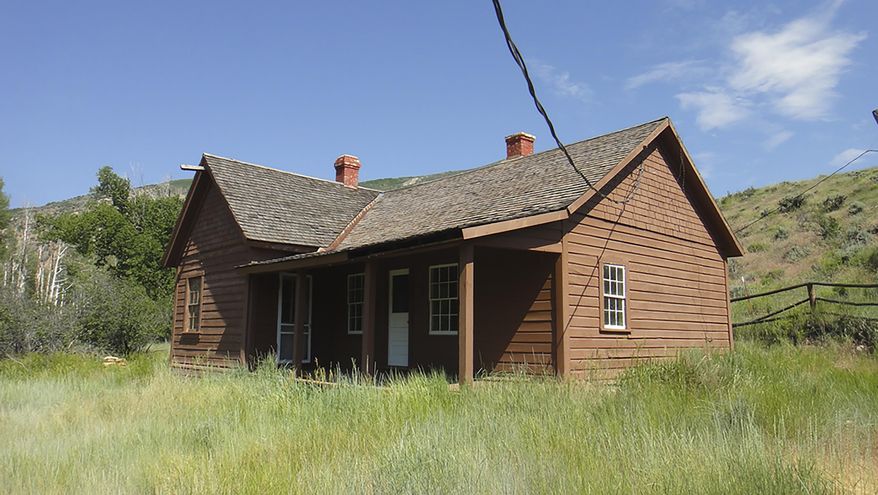 In this undated photo provided by the USDA / US Forest Service shows the Stockmore Ranger Station, nestled on the Duchesne River confluence with its West Fork near Hanna, Utah. The Ashley National Forest is proposing to get rid of its two oldest structures, both dating back nearly to the birth of the U.S. Forest Service more than a century ago. The Salt Lake Tribune reports the agency lacks the resources to properly maintain all of its historic properties. (USDA / US Forest Service, via AP)