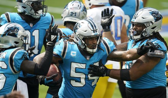 Carolina Panthers outside linebacker Shaq Thompson (54) celebrates after recovering a fumble against the Los Angeles Chargers during the first half of an NFL football game Sunday, Sept. 27, 2020, in Inglewood, Calif. (AP Photo/Alex Gallardo)
