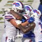 Buffalo Bills&#39; Tyler Kroft, left, celebrates with teammates after catching a pass for a touchdown during the second half of an NFL football game against the Los Angeles Rams Sunday, Aug. 26, 2018, in Orchard Park, N.Y. The Bills won 35-32. (AP Photo/Adrian Kraus)