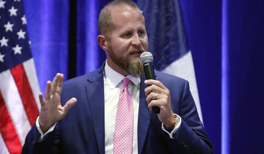In this Tuesday, Oct. 15, 2019, photo, Brad Parscale, then-campaign manager to President Donald Trump, speaks to supporters during a panel discussion, in San Antonio. (AP Photo/Eric Gay) **FILE**