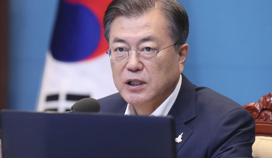 South Korean President Moon Jae-in speaks during a meeting with his senior secretaries at the presidential Blue House in Seoul, South Korea, Monday, Sept. 28, 2020. (Lee Jin-wook/Yonhap via AP)