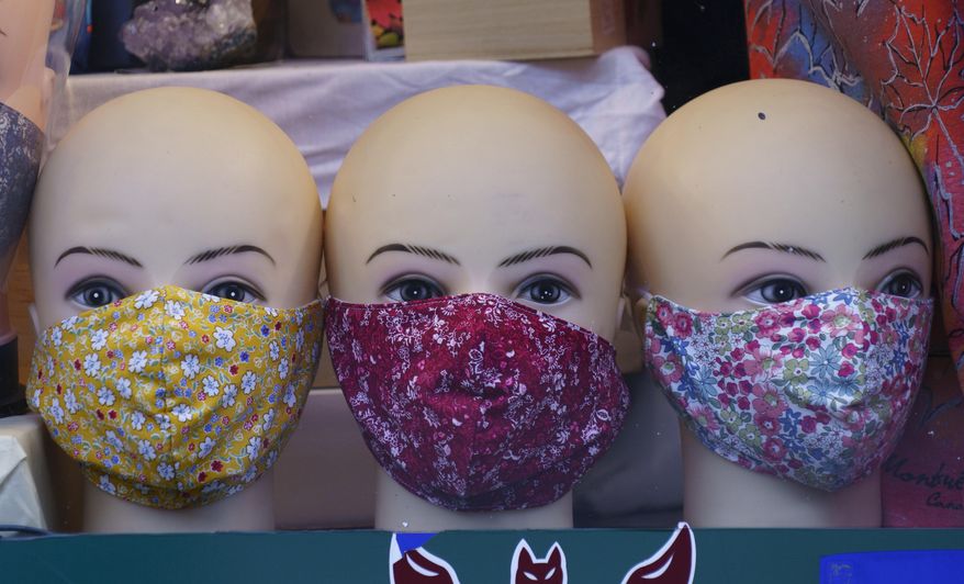Face masks are on display in a store in Montreal, Monday, Sept. 28, 2020, during the coronavirus pandemic. (Paul Chiasson/The Canadian Press via AP)